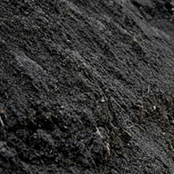 Close-up of dark top soil texture