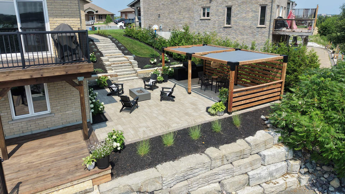 Futurescape Landscaping backyard patio with pergola, stone steps and fire pit